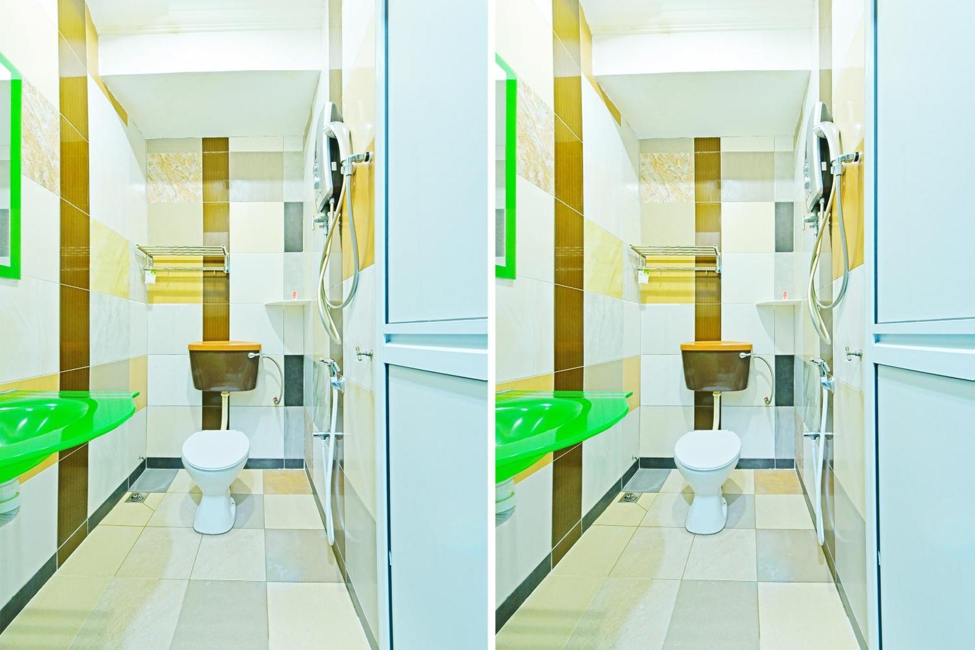 Oyo 873 Bamboo Inn Бату-Феррінгі Екстер'єр фото